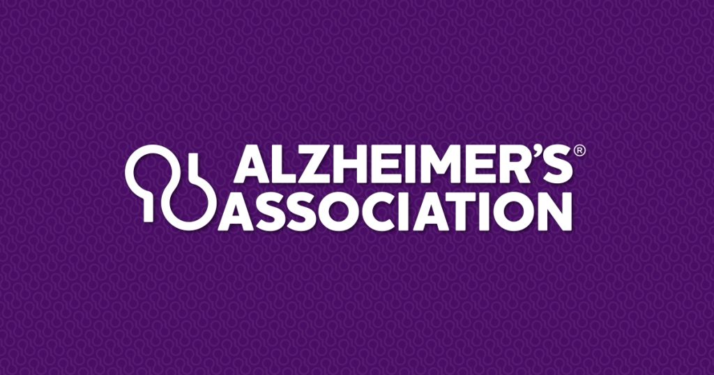 Alzheimer’s Association white logo on purple patterned background.
